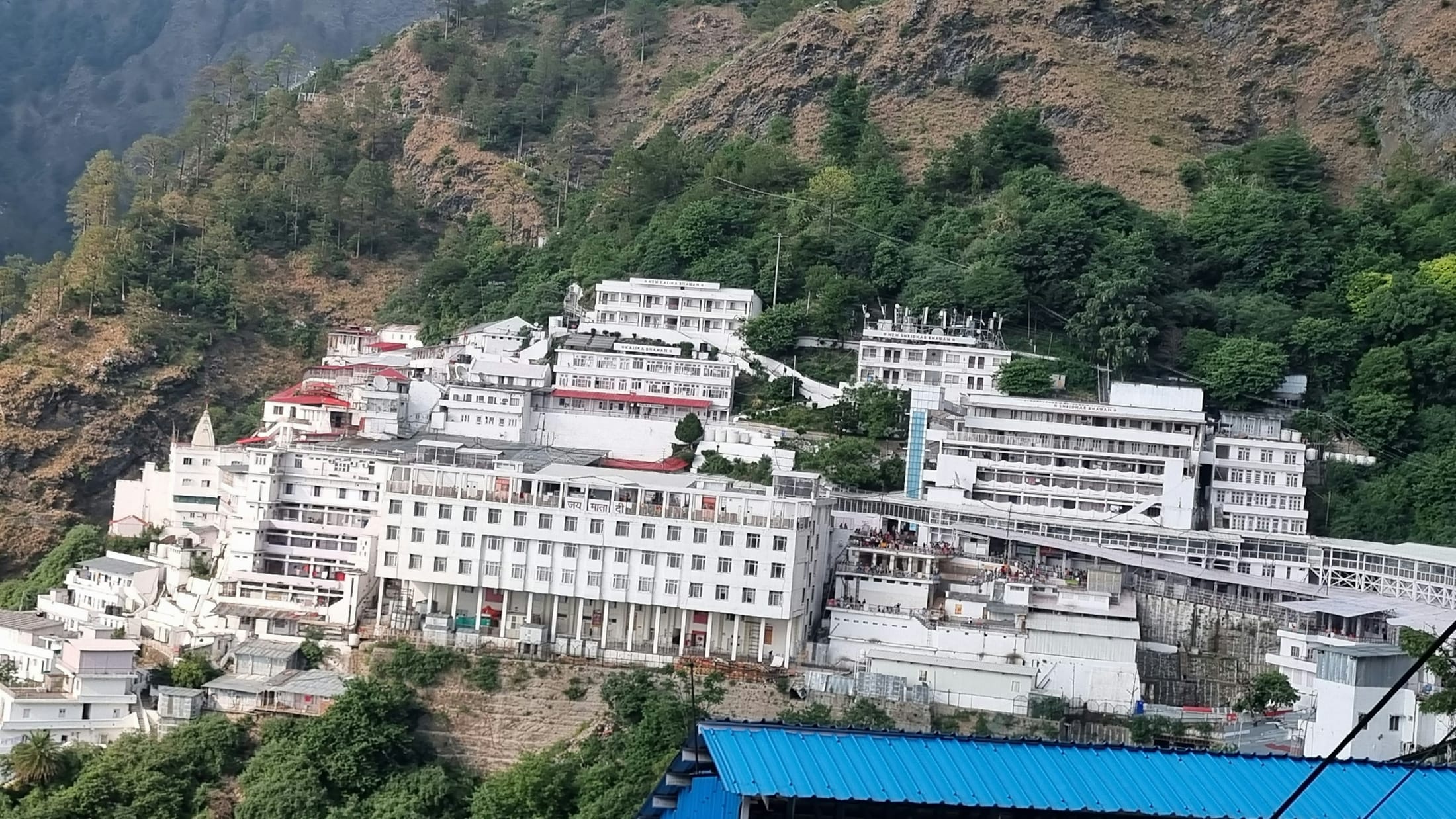 The Vaishno Devi shrine complex built into the mountainside above Katra